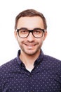 Portrait of hapy young smart man in glasses on white background