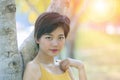 Portrait head shot of young asian beautiful woman in park