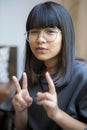 Portrait headshot of asian teenager relaxing