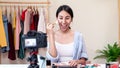 Portrait or headshot of attractive young asian influencer, beauty blogger, content creator or vlogger girl review make up looking Royalty Free Stock Photo