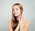 Portrait of healthy girl with brown hair and clear skin on white background. Beautiful woman face Royalty Free Stock Photo