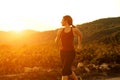 Healthy young woman jogging outdoors in nature Royalty Free Stock Photo