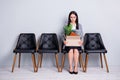 Portrait of her she attractive classy fired jobless lady office manager seeker sitting in chair holding in hands stuff