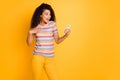 Portrait of her she nice attractive cheerful cheery wavy-haired girl wearing striped t-shirt using cell like share Royalty Free Stock Photo