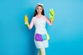 Portrait of her she nice attractive cheerful girl maid holding in hands big battle chemical detergent tidy neat rubbing Royalty Free Stock Photo