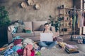 Portrait of her she nice attractive cheerful girl sitting on floor holding in hand white board giving workshop chores Royalty Free Stock Photo