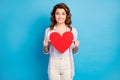 Portrait of her she nice attractive lovely pretty cheerful cheery wavy-haired girl holding in hands big paper heart Royalty Free Stock Photo