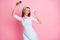 Portrait of her she nice attractive lovely pretty cute cheerful playful brown-haired housewife dancing with pepper Royalty Free Stock Photo