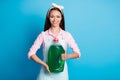 Portrait of her she nice attractive pretty cheerful cheery girl maid holding in hands big battle chemical shampoo tidy Royalty Free Stock Photo