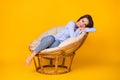 Portrait of her she nice attractive pretty cute cheerful calm dreamy girl sitting in cosy wicker chair enjoying free