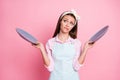 Portrait of her she nice attractive pretty sad hesitant tired bored brown-haired waitress holding in hands two plates