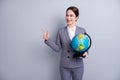 Portrait of her she nice attractive smart clever skilled cheerful specialist teacher holding in hands globe