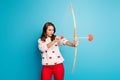 Portrait of her she nice-looking attractive lovely charming pretty cute focused girl shooting sending amorous arrow