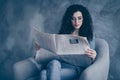 Portrait of her she nice-looking attractive lovely cute charming calm focused peaceful wavy-haired girl sitting in chair Royalty Free Stock Photo