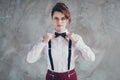 Portrait of her she nice-looking attractive lovely pretty serious classy elegant wavy-haired girl fixing bowtie wear