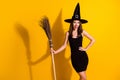 Portrait of her she nice-looking attractive pretty slender cheerful cheery lady wizard holding in hand broom magic