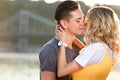 portrait of heterosexual couple going to kiss on river beach Royalty Free Stock Photo