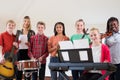 Portrait Of High School Students Playing In School Orchestra Wit Royalty Free Stock Photo