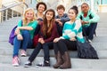 Portrait Of High School Students Sitting Outside Building Royalty Free Stock Photo