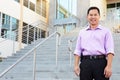 Portrait Of High School Teacher Standing Outside Building Royalty Free Stock Photo