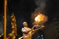 Portrait of hindu male priest performing ganga aarti in varanasi