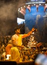 Portrait of hindu male priest performing ganga aarti in varanasi