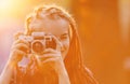 Portrait Of Hipster Girl With Dreads Taking Picture