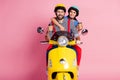 Portrait of his he her she nice attractive cheerful cheery glad couple driving moped drinking latte cappuccino having Royalty Free Stock Photo