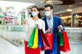 Portrait of his he her she nice attractive healthy elegant couple wearing gauze mask walking shopping mall boutique Royalty Free Stock Photo