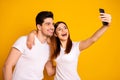 Portrait of his he her she two nice attractive stylish trendy cheerful cheery positive people making taking selfie Royalty Free Stock Photo
