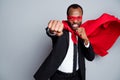 Portrait of his he nice attractive aggressive mad evil guy wearing suit hero look mask fighting enemy struggling fair Royalty Free Stock Photo