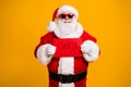 Portrait of his he nice attractive cheerful cheery confident bad Santa holding in hands red board wanted search seeking Royalty Free Stock Photo