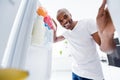 Portrait of his he nice attractive cheerful cheery hungry healthy guy looking in fridge fresh tasty yummy vitamin vegs