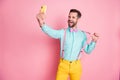 Portrait of his he nice attractive classy chic cheerful cheery glad funny brunet guy taking making selfie pulling Royalty Free Stock Photo