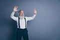 Portrait of his he nice attractive cool cheerful cheery glad excited gray-haired man waving hands having fun isolated Royalty Free Stock Photo