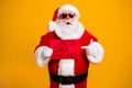 Portrait of his he nice attractive fat overweight amazed stunned Santa holding in hand demonstrating red board wanted Royalty Free Stock Photo