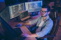 Portrait of his he nice attractive focused brunette guy creating script coding java html mysql database using languages Royalty Free Stock Photo