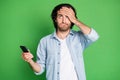 Portrait of his he nice attractive unsure depressed clueless guy using device browsing post news face palm don`t know Royalty Free Stock Photo
