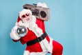 Portrait of his he nice cool fat cheerful cheery glad excited ecstatic overjoyed crazy carefree bearded Santa carrying Royalty Free Stock Photo