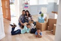 Portrait Of Hispanic Family Moving Into New Home Royalty Free Stock Photo