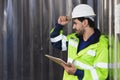 Portrait Hispanic latin engineer inspector male working in heavy industry factory smart confident