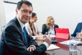 Portrait of a Hispanic middle-aged business man smiling and look Royalty Free Stock Photo