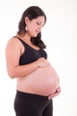 Portrait of Hispanic pregnant woman isolated over Royalty Free Stock Photo