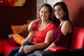 Hispanic teenage girl and her grandmother at home Royalty Free Stock Photo