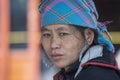 Portrait hmong ethnic woman on the street market in mountain village Sapa, North Vietnam