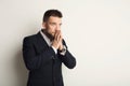 Portrait of hopeful businessman praying Royalty Free Stock Photo