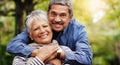 Portrait, hug and senior couple with love, outdoor and relationship with happiness, romance and retirement. Face, happy Royalty Free Stock Photo