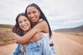 Portrait, hugging and friends on a road trip with mockup on a dirt path outdoor in nature for adventure together. Desert