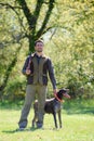 portrait hunter with dog