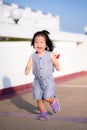 Portrait image baby age 2-3 years old. Asian Child girl don\'t like to be still running playing have fun. Sweet smile .